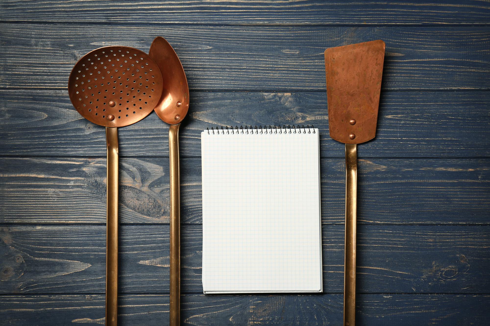 Pricing concept with menu and utensils